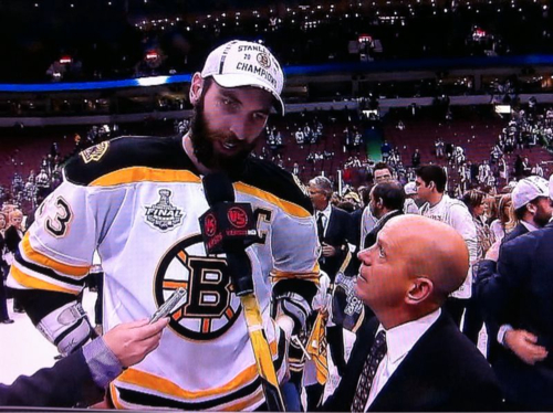 Panger interviewing Bruins big man Zdeno Chara (6'9). As you can see, Panger has his mic taped to a stick. Classic Panger.