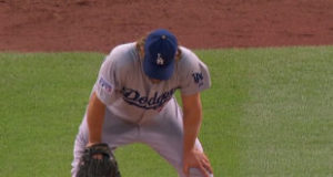 Clayton Kershaw has hands on knees after being owned by the Cardinals.